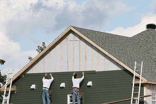 Professional Siding technician working in Verona, PA